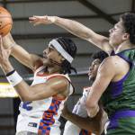 Edmonds-Woodways Julian Gray reaches up for a loose ball during the 3A boys championship game against Rainier Beach on Saturday, March 8, 2025 in Tacoma, Washington. (Olivia Vanni / The Herald)