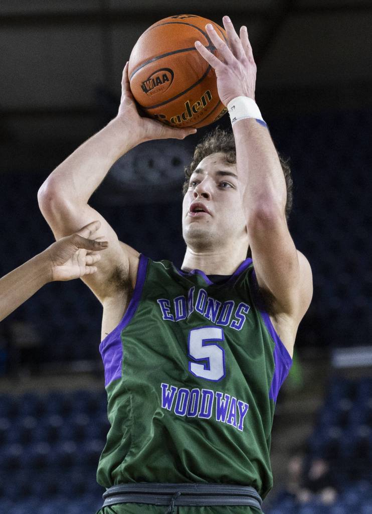 Edmonds-Woodways Cam Hiatt makes a jump shot during the 3A boys championship game against Rainier Beach on Saturday, March 8, 2025 in Tacoma, Washington. (Olivia Vanni / The Herald)