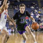 Edmonds-Woodways William Alseth takes the ball to the hoop during the 3A boys championship game against Rainier Beach on Saturday, March 8, 2025 in Tacoma, Washington. (Olivia Vanni / The Herald)