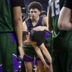 Edmonds-Woodways Julian Gray comforts his teammate William Alseth as he cries after losing the 3A boys championship game to Rainier Beach on Saturday, March 8, 2025 in Tacoma, Washington. (Olivia Vanni / The Herald)