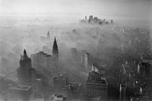 FILE — Smog in the Manhattan borough of New York on Thanksgiving Day, Nov. 24, 1966. A century ago, a well-ventilated building could be a bulwark against disease, but with the arrival of COVID-19, when buildings could barely breathe, Americans gained a renewed appreciation for the health benefits of clean air. (Neal Boenzi/The New York Times)