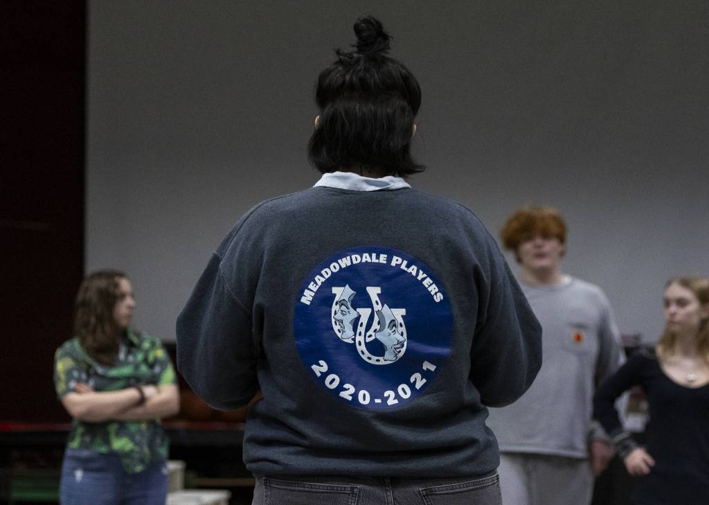Jaqueline Meyners talks to his actors before they start a full run-through of their play, Eurydice, at rehearsal on Monday, March 17, 2025, in Lynnwood, Washington. (Olivia Vanni / The Herald)