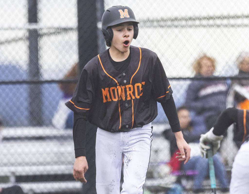 Monroes Joe Enrico cheers after scoring during the game against Kamiak on Friday, March 14, 2025 in Monroe, Washington. (Olivia Vanni / The Herald)