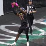 Washington Wolfpack receiver Aakiel Green (27) catches his teams first touchdown pass of the season in a 63-33 loss at Angel of the Winds Arena on March 16, 2025. (Aaron Coe / The Herald)