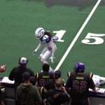 Southwest Kansas defensive back Dontra Matthews (2) looks to recover a fumble by Wolfpack receiver Deshon Williams (on ground) in Washingtons 63-33 loss at Angel of the Winds Arena on March 16, 2025. (Aaron Coe / The Herald)