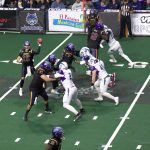 Quarterback Joe Hess (16) throws a pass during the first quarter of the Washington Wolfpacks 63-33 loss at Angel of the Winds Arena on March 16, 2025. (Aaron Coe / The Herald)