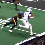 Washington linebacker Johnny Navarro (42) makes a tackle in the Wolfpacks 63-33 loss at Angel of the Winds Arena on March 16, 2025. (Aaron Coe / The Herald)