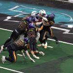 Southwest Kansas Storm quarterback Jalen Morton (7) bulls his way into the end zone on fourth down in the first quarter of the Washington Wolfpack's 63-33 loss at Angel of the Winds Arena on March 16, 2025. (Aaron Coe / The Herald)