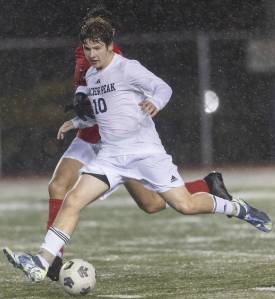 Glacier Peak’s Tyler Larsen lines up for a shot during the game against Snohomish on Wednesday, March 12, 2025 in Snohomish, Washington. (Olivia Vanni / The Herald)