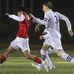 Snohomish’s Bryant Antonio Recendez gets around Glacier Peak’s Federico Zamolo during the game on Wednesday, March 12, 2025 in Snohomish, Washington. (Olivia Vanni / The Herald)