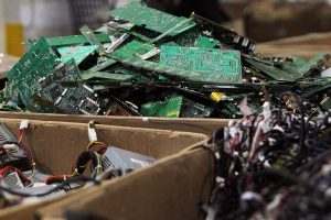 Genna Martin / The Herald
Piles of wires, motherboards and other electronic parts fill boxes at E-Waste Recycling Center, Thursday. 
Photo taken 1204014