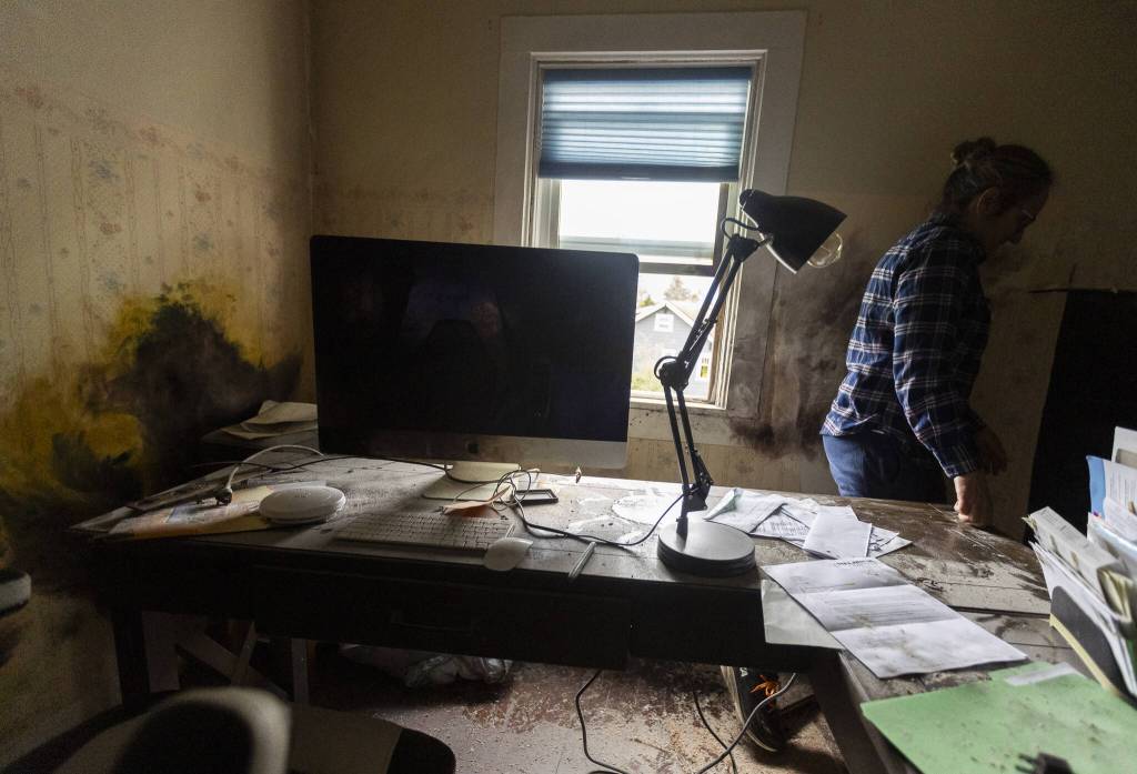 Inside Nichols office, which was covered by debris after lighting started a small fire on Thursday, March 27, 2025 in Everett, Washington. (Olivia Vanni / The Herald)