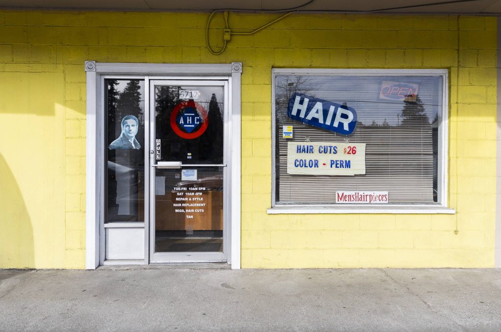 The outside of AHC Salon on Evergreen Way in Everett. Also housed in the buiding is AHC Barber & Beauty College. (Olivia Vanni / The Herald)
