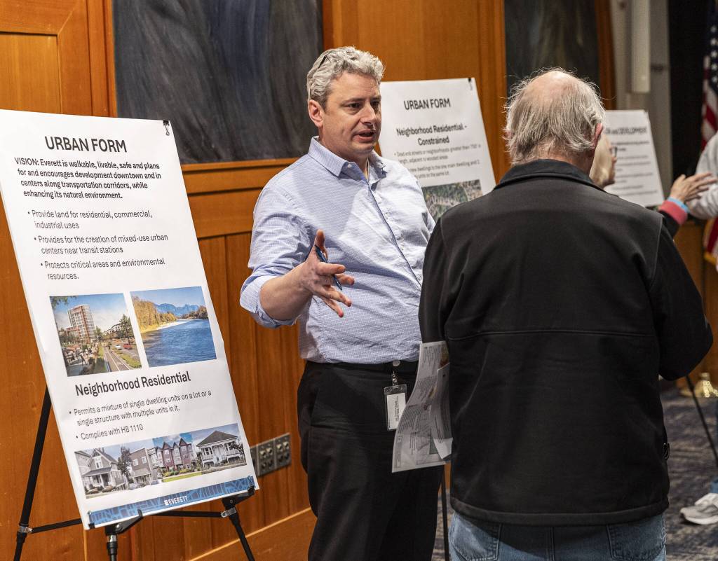 City of Everett Planning Director Yorik Stevens-Wajda answers questions during an Everett Planning Department open house at Everett Station on Wednesday, Feb. 26, 2025 in Everett, Washington. (Olivia Vanni / The Herald)