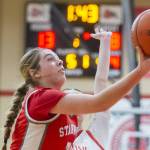 Stanwood's Ellalee Wortham tries to make a one-handed layup during the game against Snohomish on Thursday, Jan. 9, 2025 in Snohomish, Washington. (Olivia Vanni / The Herald)