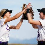 Lake Stevens pitcher Charli Pugmire high fives first baseman Emery Fletcher after getting out of an inning against Glacier Peak on Tuesday, April 23, 2024, at Glacier Peak High School in Snohomish, Washington. (Ryan Berry / The Herald)