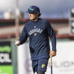 AquaSox Manager Zach Vincej walks onto the field to run drills during practice at Funko Field on Tuesday, April 1, 2025 in Everett, Washington. (Olivia Vanni / The Herald)