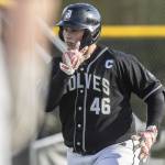 Jacksons Sam Craig runs into home plate after hitting a home run during the game against Edmonds-Woodway on Wednesday, April 2, 2025 in Edmonds, Washington. (Olivia Vanni / The Herald)