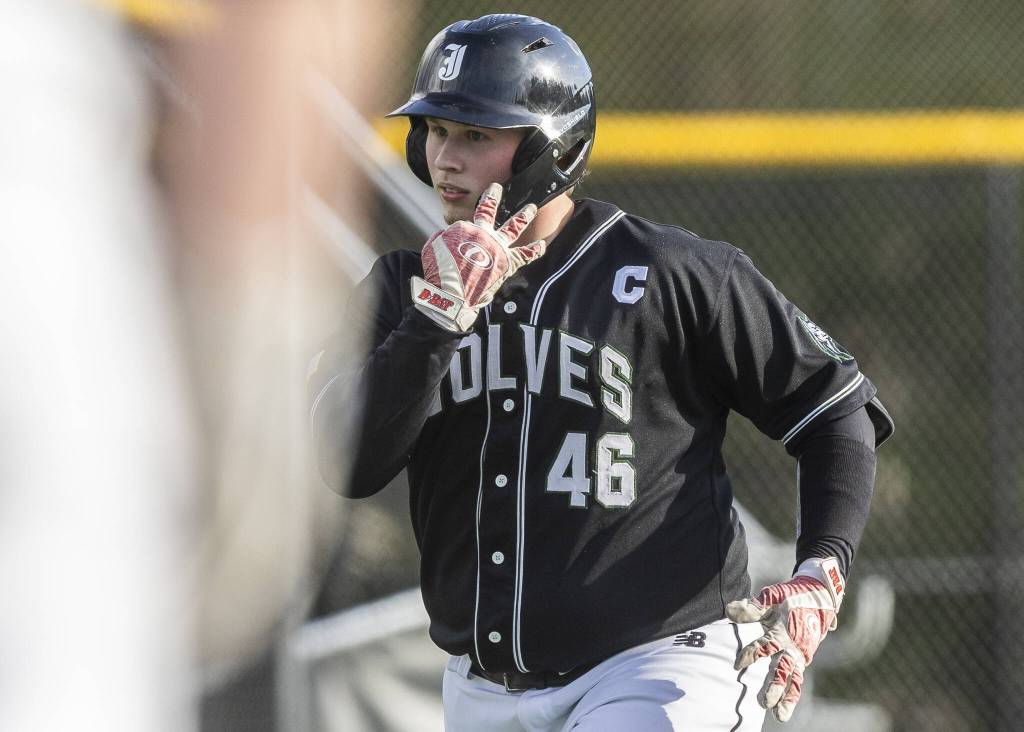 Jacksons Sam Craig runs into home plate after hitting a home run during the game against Edmonds-Woodway on Wednesday, April 2, 2025 in Edmonds, Washington. (Olivia Vanni / The Herald)