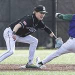 Jacksons Austin Halvorson tags Edmonds-Woodways Toshi Gilginas as he slides into second for the out during the game on Wednesday, April 2, 2025 in Edmonds, Washington. (Olivia Vanni / The Herald)