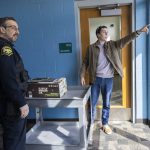 Bryson Fico, right, and custody officer Jason Morton grab a cart to carry Ficos book donations on Saturday, April 5, 2025, in Marysville, Washington. (Olivia Vanni / The Herald)