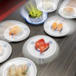 A selection of different food options ranging from sushi rolls to nigiri, at Kura Revolving Sushi Bar on Monday, April 7, 2025 in Lynnwood, Washington. (Olivia Vanni / The Herald)