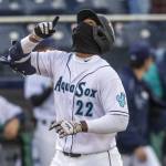 Everett AquaSox outfielder Lazaro Montes point up as he runs into home to score after hitting a home run during the Opening Day game against the Hillsboro Hops on Tuesday, April 8, 2025 in Everett, Washington. (Olivia Vanni / The Herald)
