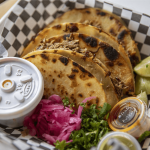 Beef birria tacos at El Mariachi in Everett, Washington on Wednesday, July 5, 2023. (Annie Barker / The Herald)