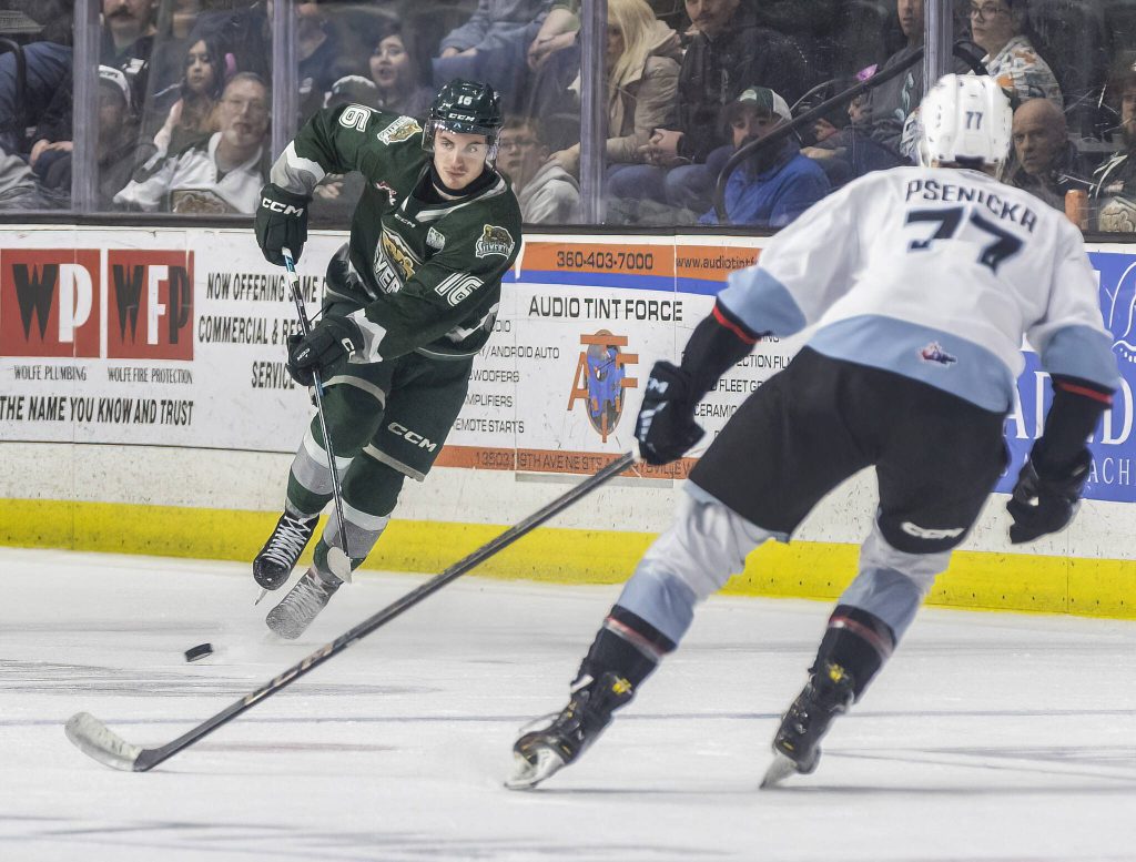 Everett Silvertips forward Dominik Rymon passes the puck during the second round WHL playoff game against the Portland Winterhawks on Friday, April 11, 2025 in Everett, Washington. (Olivia Vanni / The Herald)