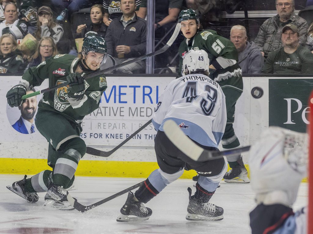 Everett Silvertips defenceman Tarin Smith takes a shot on goal during the second round WHL playoff game against the Portland Winterhawks on Friday, April 11, 2025 in Everett, Washington. (Olivia Vanni / The Herald)