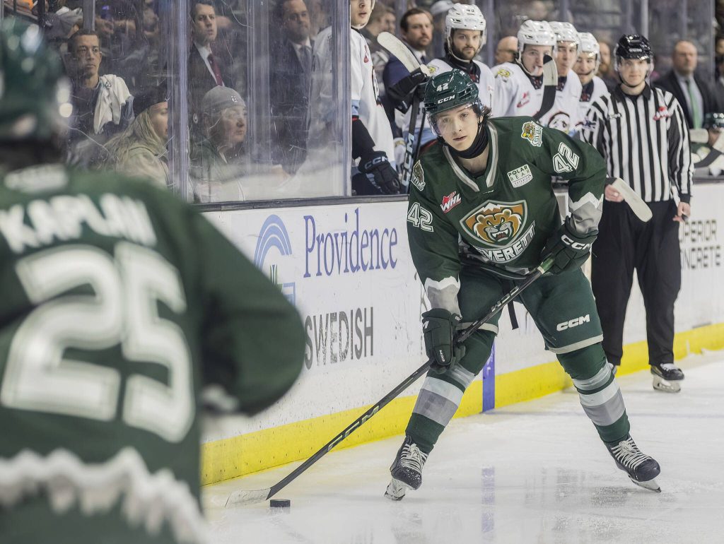 Everett Silvertips defenceman Brek Liske passes the puck to teammate forward Lukas Kaplan during the second round WHL playoff game against the Portland Winterhawks on Friday, April 11, 2025 in Everett, Washington. (Olivia Vanni / The Herald)