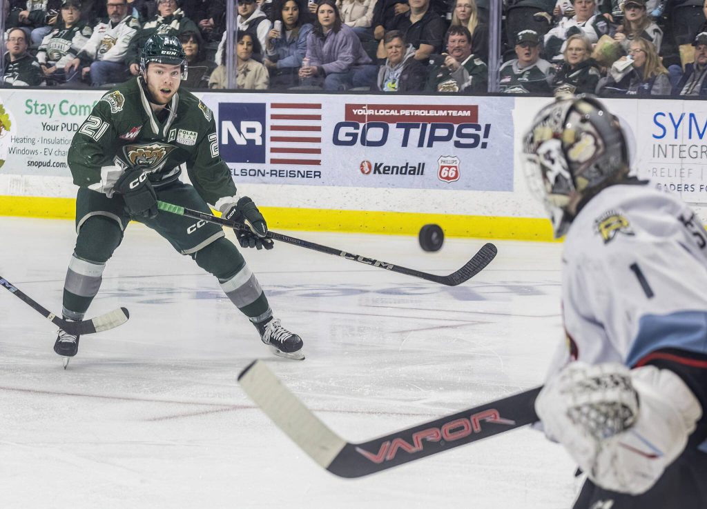 Everett Silvertips forward Tyler MacKenzie takes a shot on goal during the second round WHL playoff game against the Portland Winterhawks on Friday, April 11, 2025 in Everett, Washington. (Olivia Vanni / The Herald)