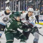 Everett Silvertips’ forward Austin Roest scrambles after a loose puck infant of the goal during the second round WHL playoff game against the Portland Winterhawks on Friday, April 11, 2025 in Everett, Washington. (Olivia Vanni / The Herald)