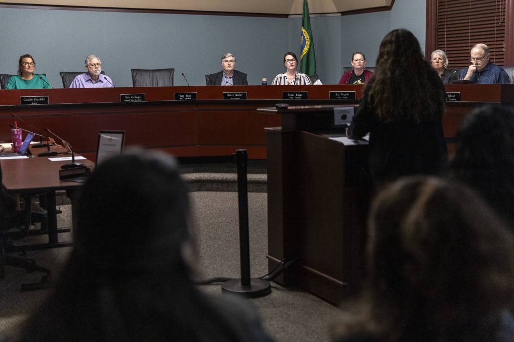 The Everett City Council listens as Casino Road residents share their concerns about possible displacement and rent increases on Wednesday, April 16, 2025 in Everett, Washington. (Olivia Vanni / The Herald)