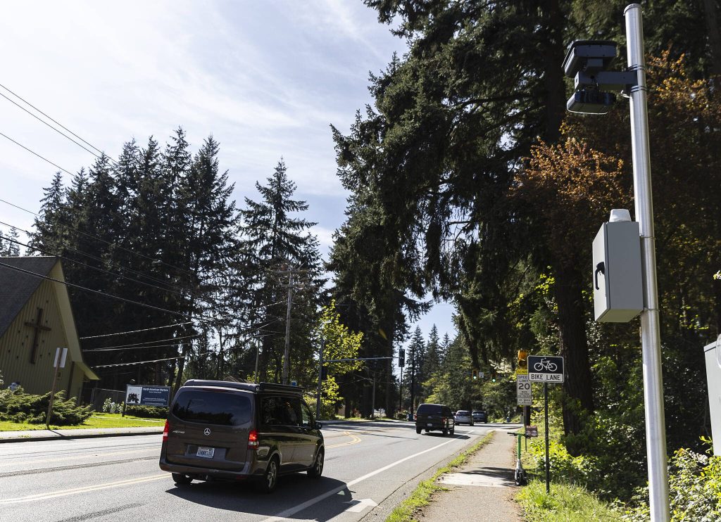 Olivia Vanni / The Herald 
Cars drive past a newly installed traffic camera along 100th Avenue West on April 14 in Edmonds.