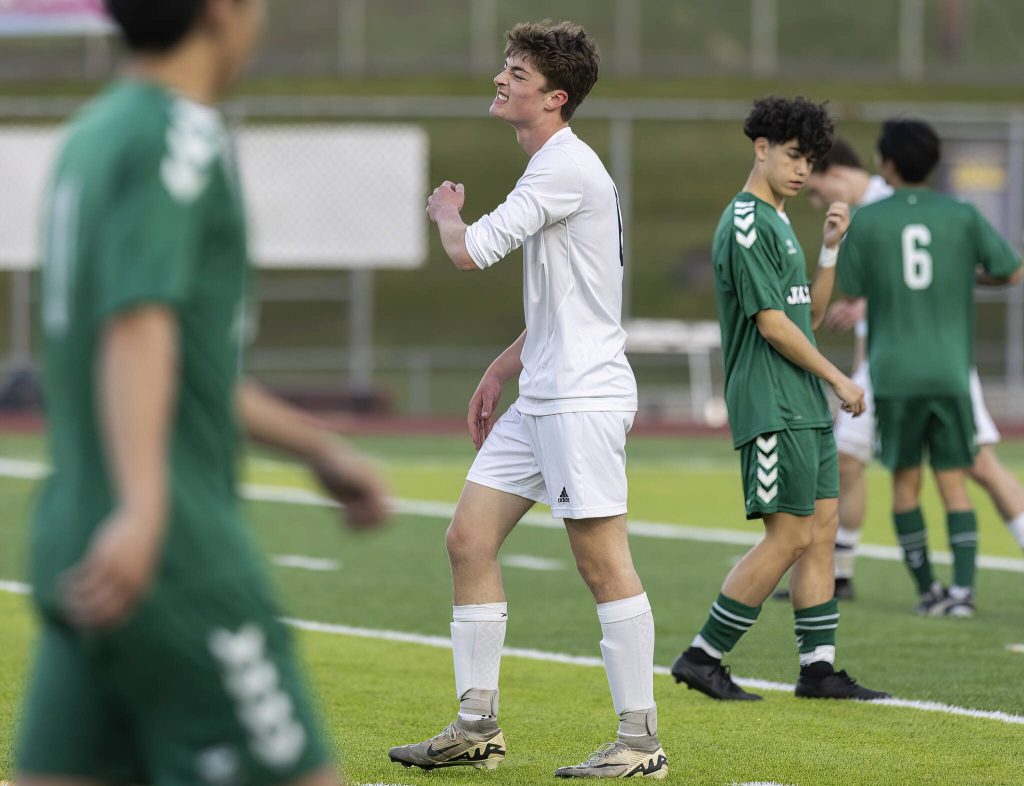 Glacier Peaks Liam Smith grimaces after just missing a shot on goal during the game against Jackson on Tuesday, April 15, 2025 in Everett, Washington. (Olivia Vanni / The Herald)
