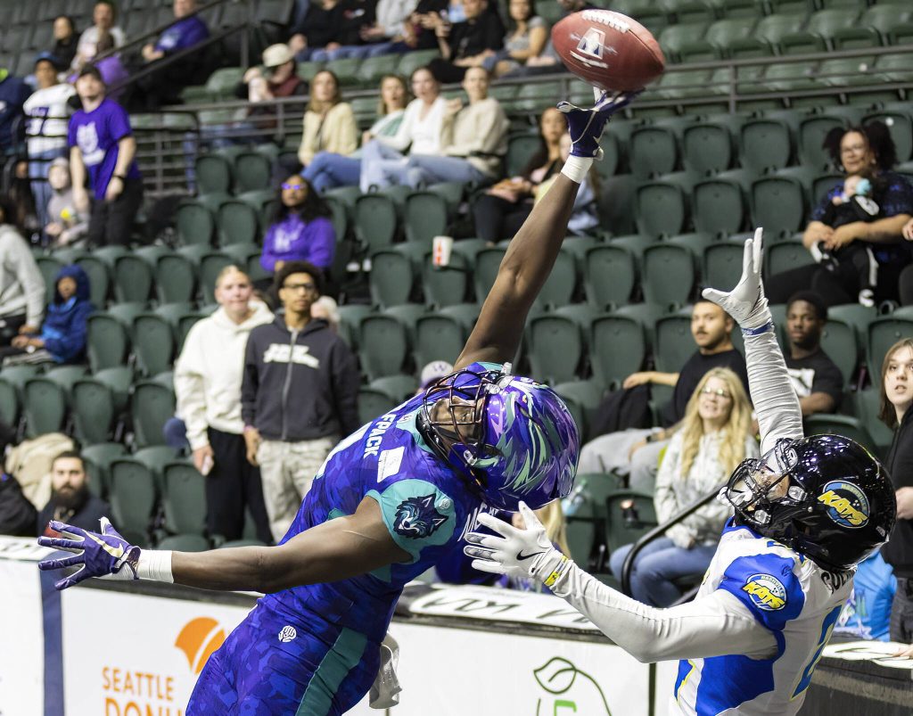 Washington Wolfpacks Ledarian McAllister reaches up to try and make a catch in the end zone during the game against the Nashville Kats on Thursday, April 17, 2025 in Everett, Washington. (Olivia Vanni / The Herald)