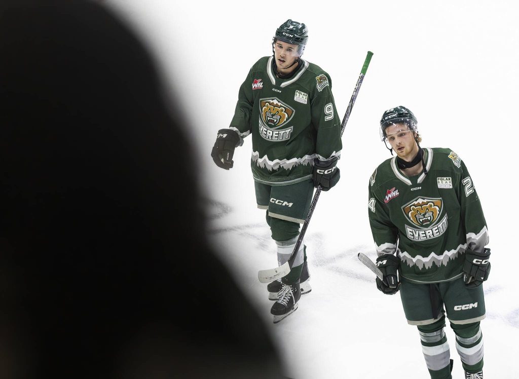 Everett Silvertips Landon DuPont and Tarin Smith skate off the ice after Portland Winterhawks score in an open net in the final minute of game seven of the second round of the WHL playoffs on Tuesday, April 22, 2025 in Everett, Washington. (Olivia Vanni / The Herald)