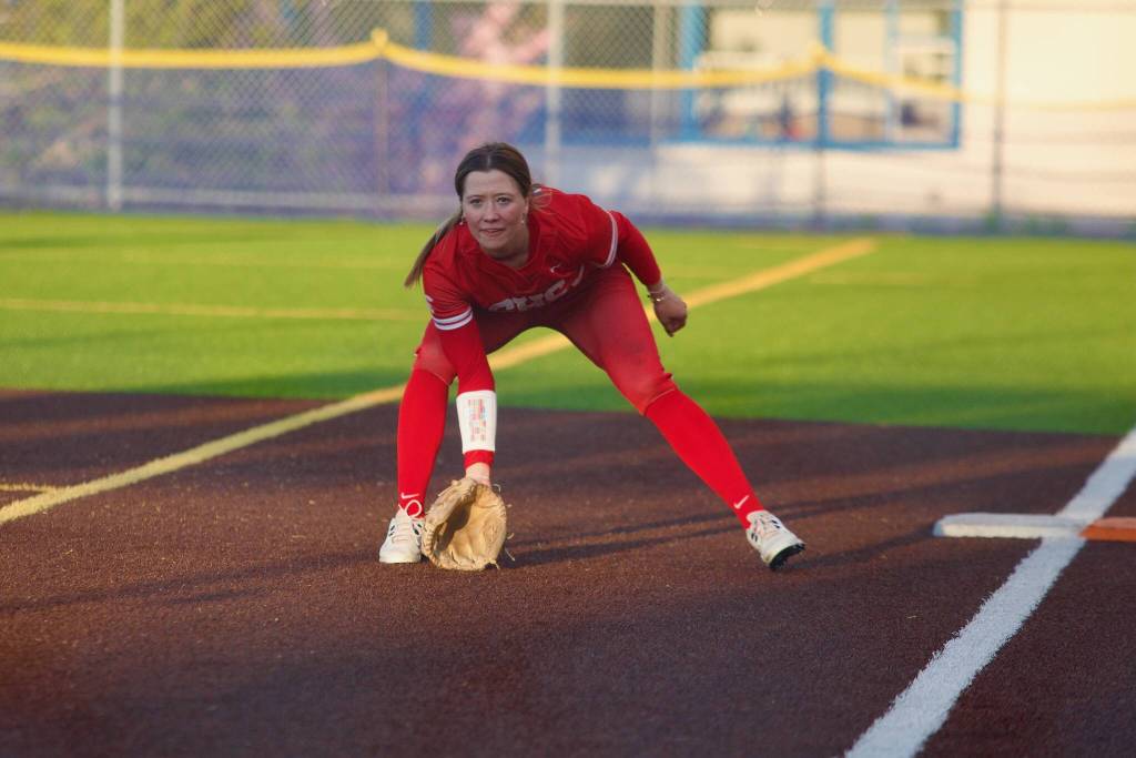 Stanwood senior Reagan Ryan lowers her glove to field a ground ball at first base during the Spartans 11-1 win against Everett at Lincoln Field in Everett, Washington on April 21, 2025. (Joe Pohoryles / The Herald)