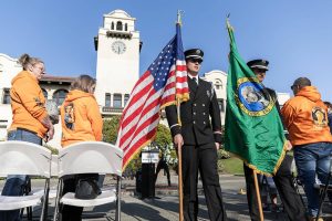 Everett Fire Department’s color guard Jozef Mendoza, left, and Grady Persons, right, parade the colors at the end of the ceremony on Worker’s Memorial Day on Wednesday, April 23, 2025 in Everett, Washington. (Olivia Vanni / The Herald)