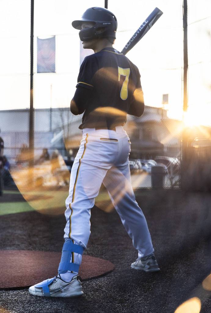 Everetts Owen Brunni warms up in the on deck circle during the game against Monroe on Wednesday, April 23, 2025 in Monroe, Washington. (Olivia Vanni / The Herald)