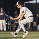 Monroes Caleb Campbell runs up to grab a bunt during the game against Everett on Wednesday, April 23, 2025 in Monroe, Washington. (Olivia Vanni / The Herald)