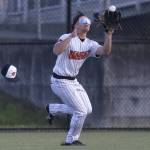 Monroes BK Kingsley loses his hat as he runs after the ball to make a catch in the outfield during the game against Everett on Wednesday, April 23, 2025 in Monroe, Washington. (Olivia Vanni / The Herald)