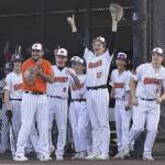 The Monroe dugout clears in celebrate of their teammates hit during the game against Everett on Wednesday, April 23, 2025 in Monroe, Washington. (Olivia Vanni / The Herald)