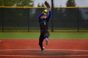 Shorewood junior Ellie Van Horn winds up to deliver a pitch in the Stormrays' 12-0 win against Shorecrest in Shoreline, Washington on April 28, 2025. (Joe Pohoryles / The Herald)