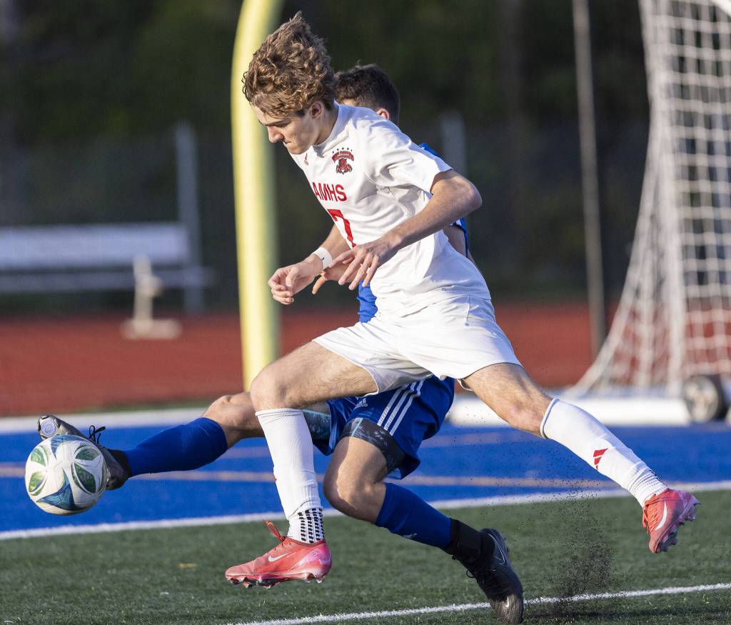 Shorewoods George Clark knocks the ball away from Archbishop Murphys Zach Mohr during the game on Wednesday, April 30, 2025 in Shoreline, Washington. (Olivia Vanni / The Herald)