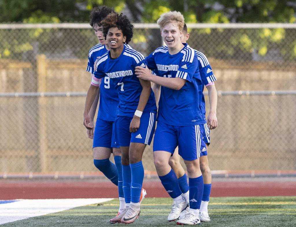 Shorewoods Matthew Bereket celebrates with his teammates after scoring a goal during the game against Archbishop Murphy on Wednesday, April 30, 2025 in Shoreline, Washington. (Olivia Vanni / The Herald)