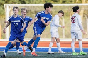 Shorewood’s Kai Ayers yells in celebration after scoring a goal during the game against Archbishop Murphy on Wednesday, April 30, 2025 in Shoreline, Washington. (Olivia Vanni / The Herald)