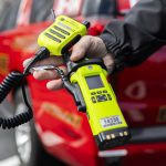 Everett Fire Chief Dave DeMarco shows one of the new fire and EMS department radios at a press conference outside of the new Snohomish County 911 building on Wednesday, April 30, 2025 in Everett, Washington. (Olivia Vanni / The Herald)