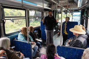 Ryan Bisson speaks to seniors attending a transit workshop hosted by Community Transit on Friday, May 2, 2025 in Everett, Washington. (Will Geschke / The Herald)
